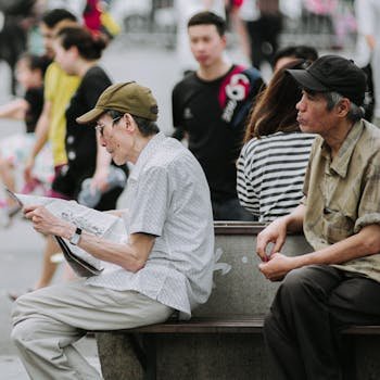 A group of German people reading the Bild newspaper