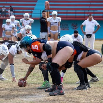 Kabaddi defenders executing a chain tackle