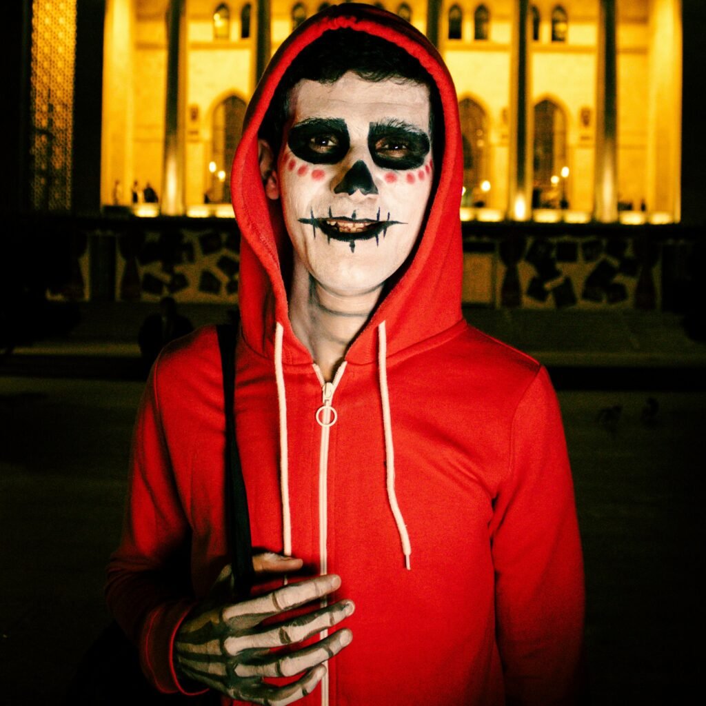 Image of teachers in Halloween costumes with a serious expression